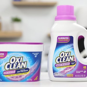 a tub and bottle of oxiclean in a kitchen