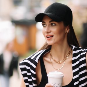 woman wearing a pin stripe top on a street