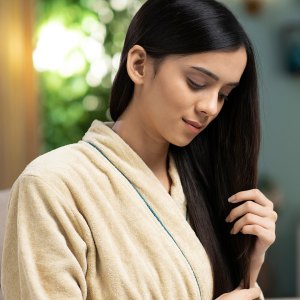 Young Woman hair care, stock photo