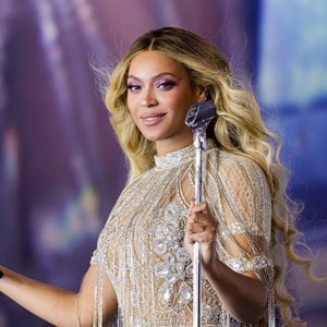 beyonce in silver rhinestone outfit on stage