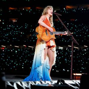 Taylor Swifts New Surprise Song Dress Perfectly Matches Speak Now World Tour Koi Fish Guitar