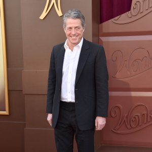 Hugh Grant Got ‘Smashed’ With Travis Kelce at Taylor Swift’s ‘Eras Tour’