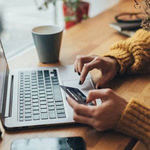 woman with laptop and credit card