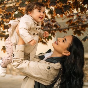 Mother and daughter playing in park,Spain