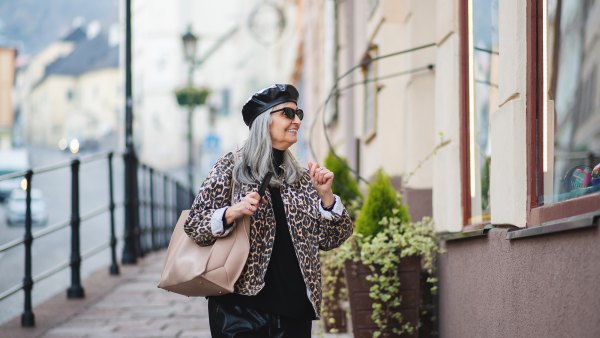 Old woman wearing fashionable clothes.