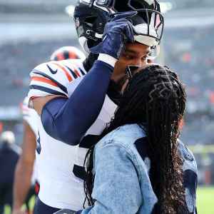 Simone Biles Kisses Husband Jonathan Owens on Sidelines Before Bears Game Against the Vikings