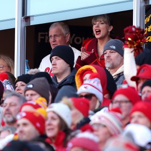 KANSAS CITY, MISSOURI - NOVEMBER 29: Singer Taylor Swift cheers during the first half of the game between the Las Vegas Raiders and the Kansas City Chiefs at GEHA Field at Arrowhead Stadium on November 29, 2024 in Kansas City, Missouri. (Photo by David Eulitt/Getty Images)