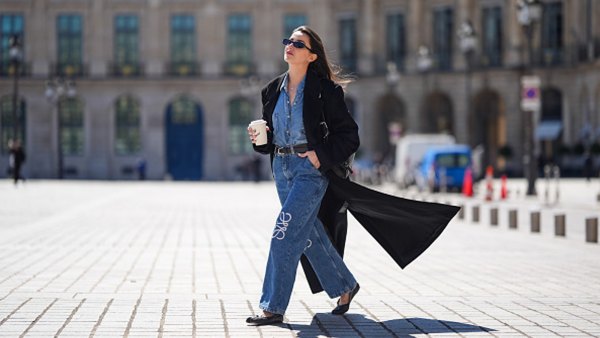 woman wearing jeans, denim top and coat