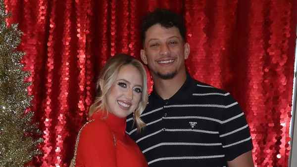 Patrick Mahomes and Pregnant Wife Brittany Cuddle Up at Chiefs Christmas Party