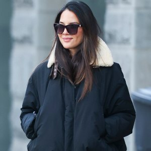 Olivia Munn wears a Loewe puffer jacket while on December 26, 2024 in New York City.