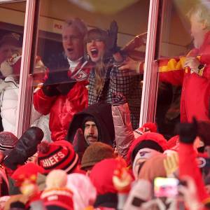 KANSAS CITY, MISSOURI - JANUARY 18: Singer-songwriter Taylor Swift celebrates Travis Kelce #87 of the Kansas City Chiefs touchdown against the Houston Texans during the fourth quarter in the AFC Divisional Playoff at GEHA Field at Arrowhead Stadium on January 18, 2025 in Kansas City, Missouri. (Photo by David Eulitt/Getty Images)