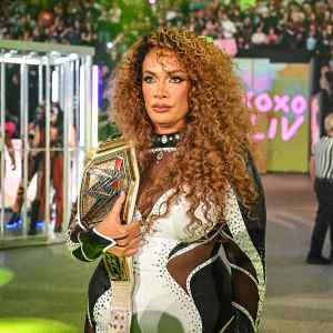 WWE s Nia Jax Jokes There Are a Couple People She d Like to Kick Out of Women s Locker Room 102