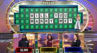 Wheel of Fortune Contestant Engages After Solving Proposal Puzzle