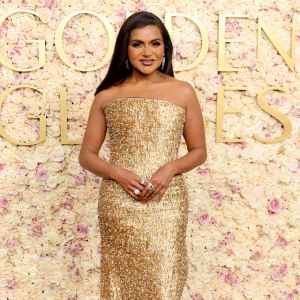 Mindy Kaling Shimmers While Walking 2025 Golden Globes Red Carpet
