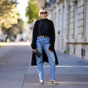 Emy Venturini in black cardigan and jeans