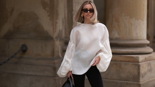 woman in white top and black pants