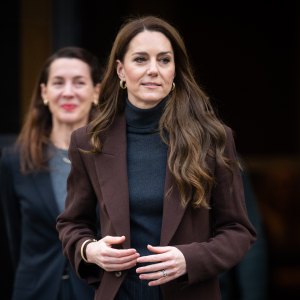 kate middleton wearing brown blazer and gray sweater