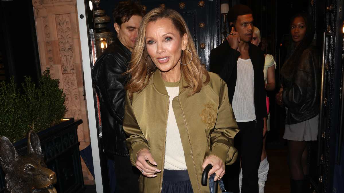vanessa williams in green olive jacket