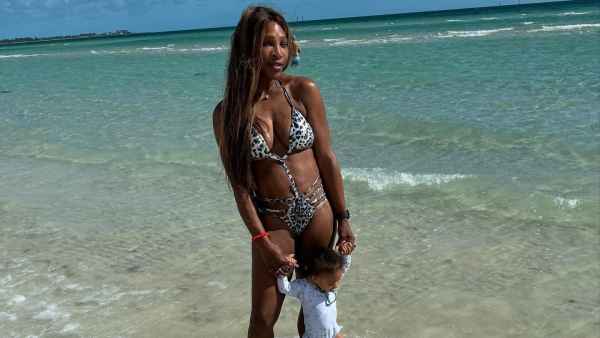 Serena Williams shows off her toned physique in leopard print bikini