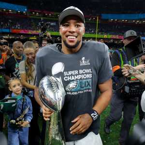Shirtless Saquon Barkley Shotguns Beers in Locker Room After Super Bowl