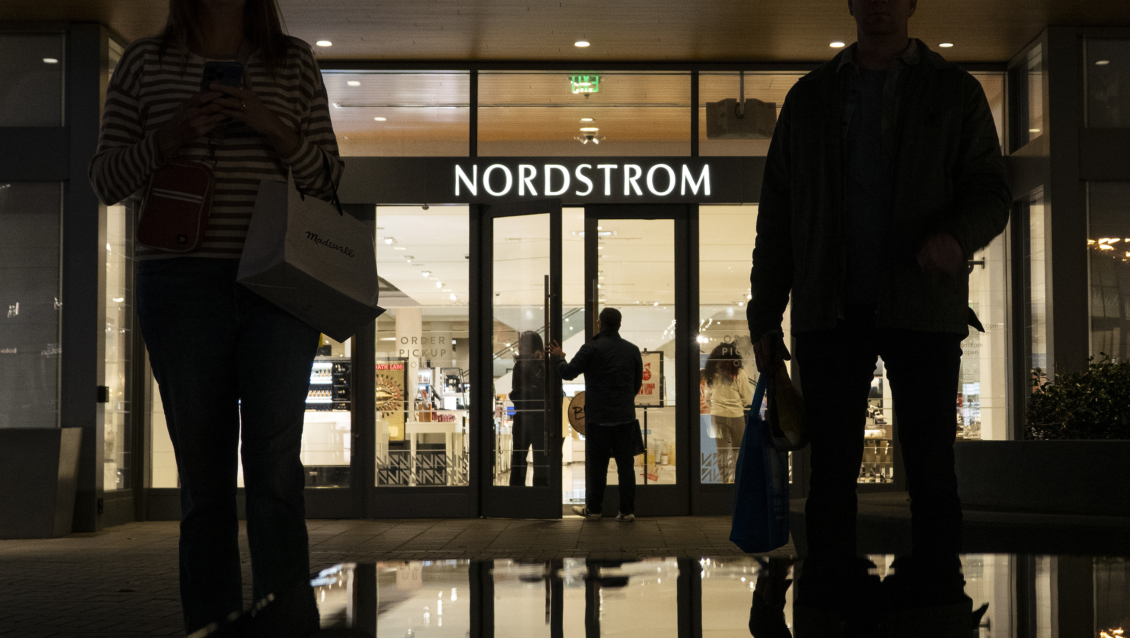 SAN DIEGO, CALIFORNIA - JANUARY 31: Shoppers walk near a Nordstrom store at the Westfield UTC shopping center on January 31, 2025 in San Diego, California. (Photo by Kevin Carter/Getty Images)