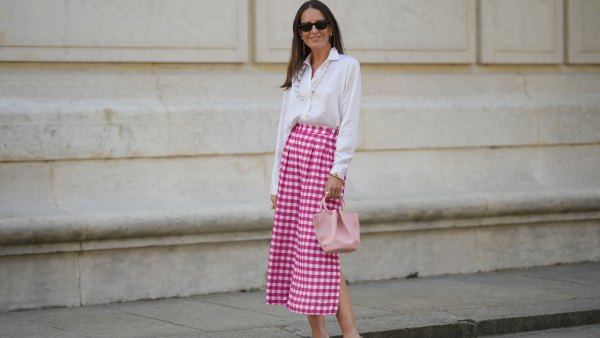 woman wearing white blouse and pink skirt