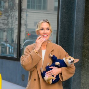 Jennie Garth in tan trench coat