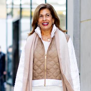 Hotda Kotb in tan vest and white pants