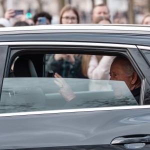 King Charles in a car