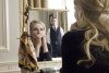 Kirsten Dunst looks in a mirror while Ryan Gosling watches in All Good Things.
