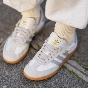 PARIS, FRANCE - OCTOBER 23: Diane Batoukina wears white socks, white Samba Adidas sneakers shoes, during a street style fashion photo session, on October 23, 2024 in Paris, France. (Photo by Edward Berthelot/Getty Images)