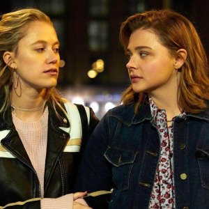 Two women look at each other in Greta.