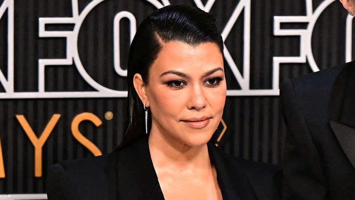 US socialite Kourtney Kardashian and husband US musician Travis Barker arrive for the 75th Emmy Awards at the Peacock Theatre at L.A. Live in Los Angeles on January 15, 2024. (Photo by Frederic J. Brown / AFP) (Photo by FREDERIC J. BROWN/AFP via Getty Images)
