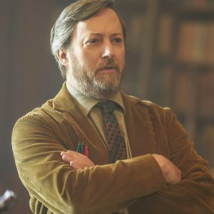 A man crosses his arms in Ludwig.