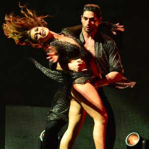 Alan Bersten and Emma Slater Wrap ‘Dancing With the Stars’ Tour With Sizzling Stage Kiss