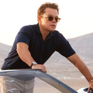 Matt Damon and Christian Bale look at the race track in Ford v Ferrari.