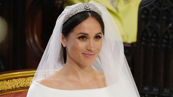 US fiancee of Britain's Prince Harry, Meghan Markle arrives at the High Altar for their wedding ceremony in St George's Chapel, Windsor Castle, in Windsor, on May 19, 2018.