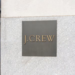 New York City, USA - August 21, 2022: A J.Crew store sign on the building is seen on Fifth Ave. in New York City, USA. J.Crew Group, Inc., is an American multi-brand, multi-channel, specialty retailer.