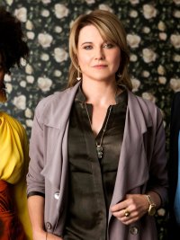 Three people stand and look at the camera in My Life is Murder.