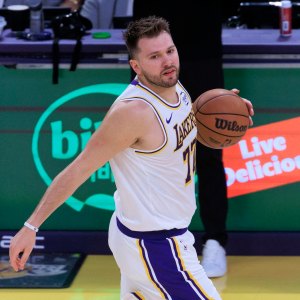 NBA s Luka Doncic Ejected From Game for Bizarre Incident With Fan and Referee