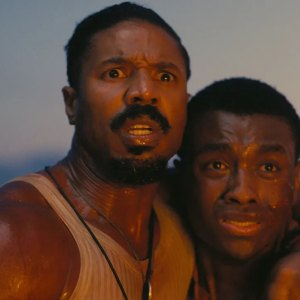 Michael B. Jordan and Miles Caton in Sinners.