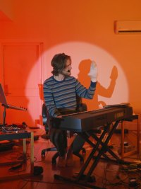 Bo Burnham plays piano in his special, 'Inside.'