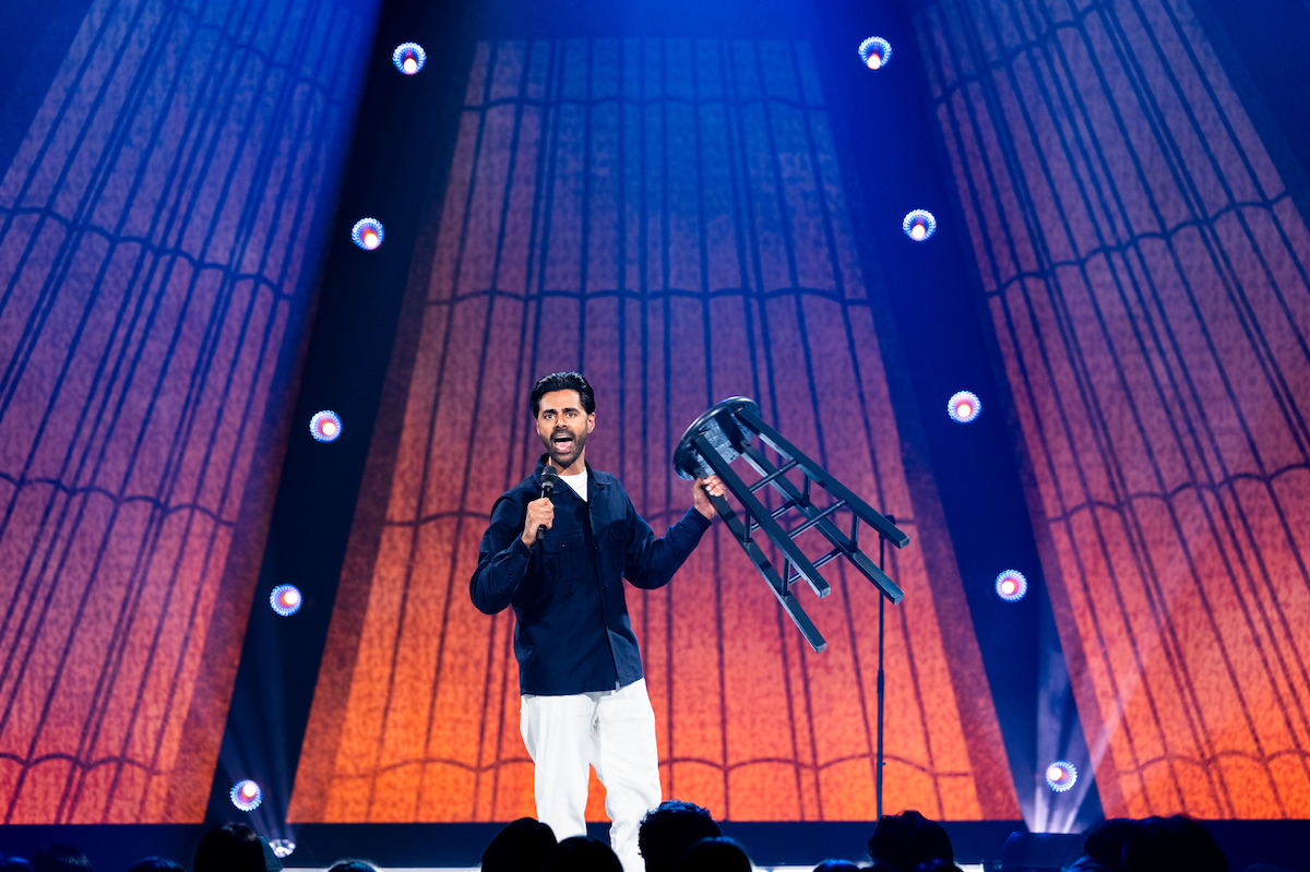 Hasan Minhaj onstage in 'Off With His Head.'