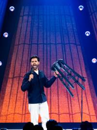 Hasan Minhaj onstage in 'Off With His Head.'