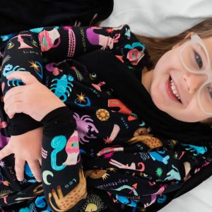 Parents Will Secretly Love Little Sleepies' Zodiac Pajama Collection More Than Their Kids