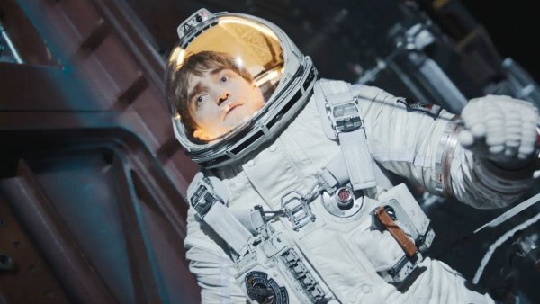 An astronaut floats in space in Mickey 17.