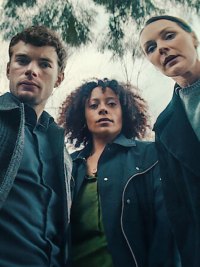 Three people look down at the camera in Missing You.