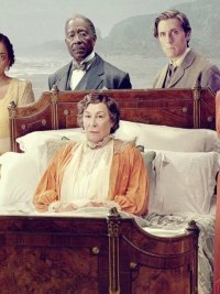 People stand around a woman in bed in Agatha Christie's Towards Zero.