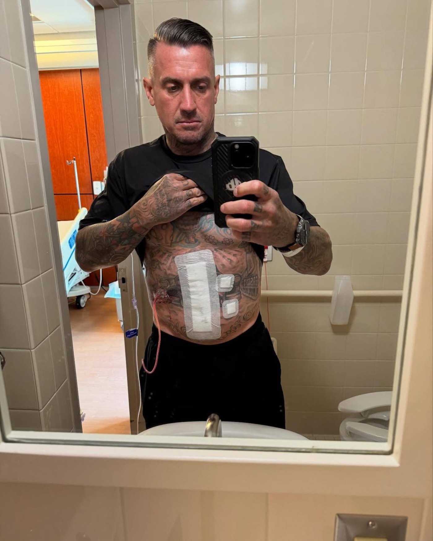 Carey Hart Credits Pink After Gruesome Motocross Injury | Us Weekly