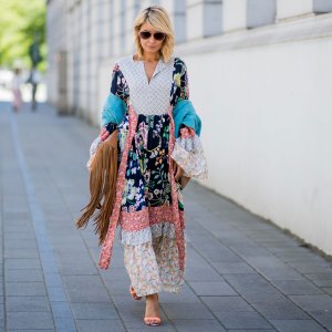 DUESSELDORF, GERMANY - MAY 05: Gitta Banko wearing a long Boho dress by Perseverance London, turquoise turn-over half-sleeve scarf by Blondwalk 4 a cuckoo moment, multi-colored strappy open-toe sandals by Sophia Webster, cognac-colored fringed oversize leather bag by Amma Mode, and sunglasses by Michael Kors on May 5, 2018 in Duesseldorf, Germany. (Photo by Christian Vierig/Getty Images)